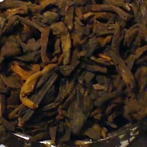 Dried sliced mushrooms in a bowl.