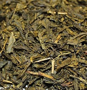 Close-up of loose green tea leaves.