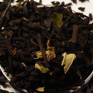 Close-up of dried loose-leaf tea with flower petals.