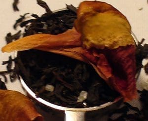 Dried flower petals in a small container.