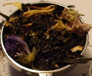 Herbal tea leaves with dried flowers.